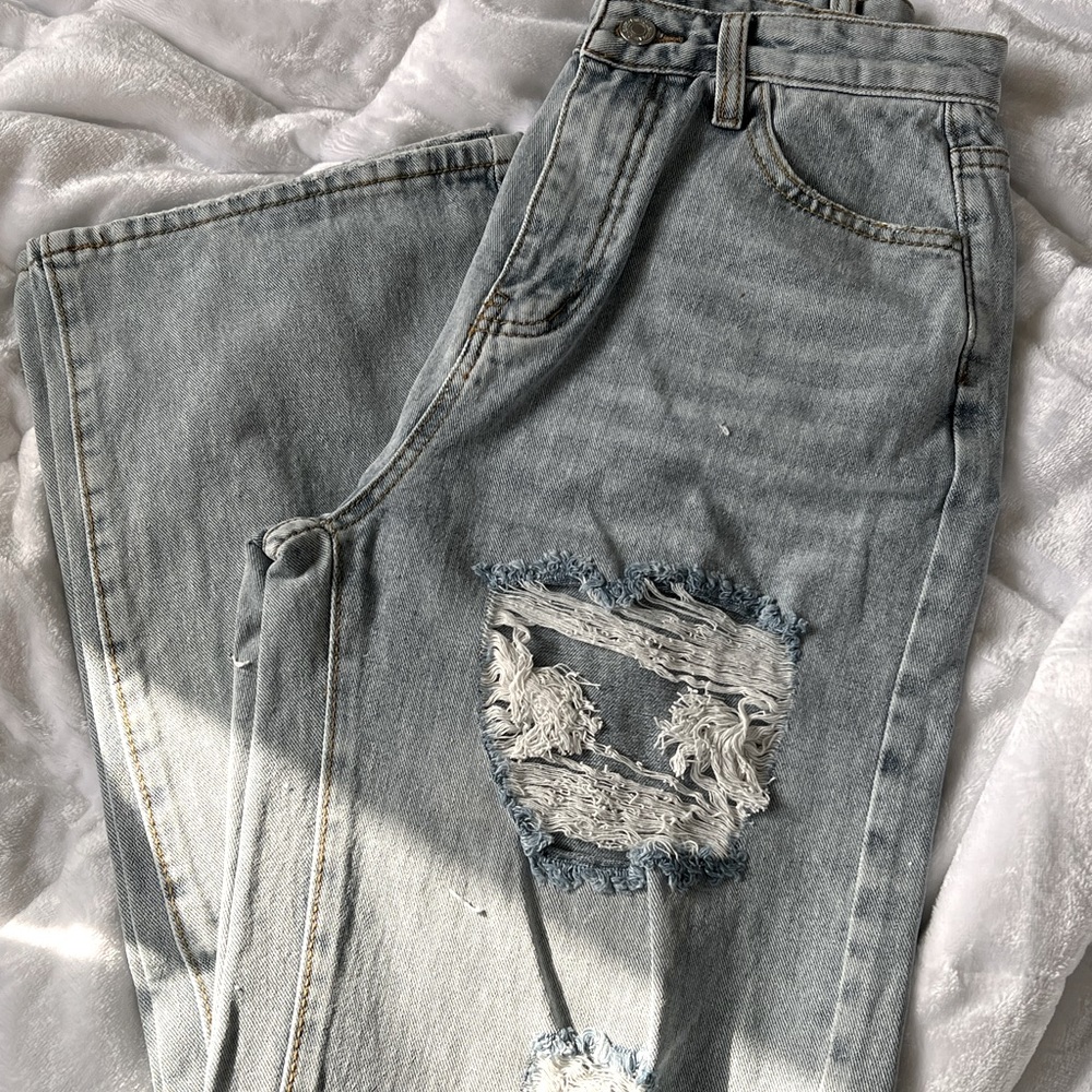 Ripped cowgirl jeans